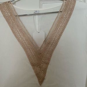 White linen blend dress Gold embroidered neckline. Above knee. Great fabric.